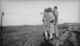 [David, Megan, Margaret and Gwilym Lloyd George surveying a WW1 battlefield]