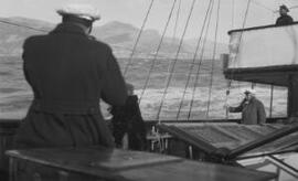 [David and Margaret Lloyd George aboard 'Sabrina' in rough seas off the coast of Italy]