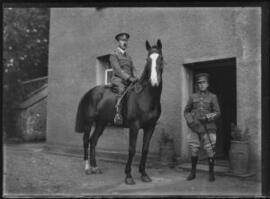 [Two Lieutenants, one  in the Pembroke Yeomanry astride a horse]