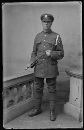 [Soldier in Welsh Regiment with swagger stick]