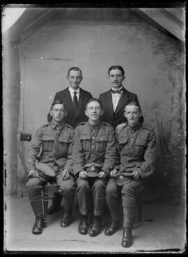 [Two civilians and three soldiers]