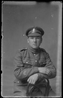 [Half-length studio portrait of a soldier in the Welsh Regiment]